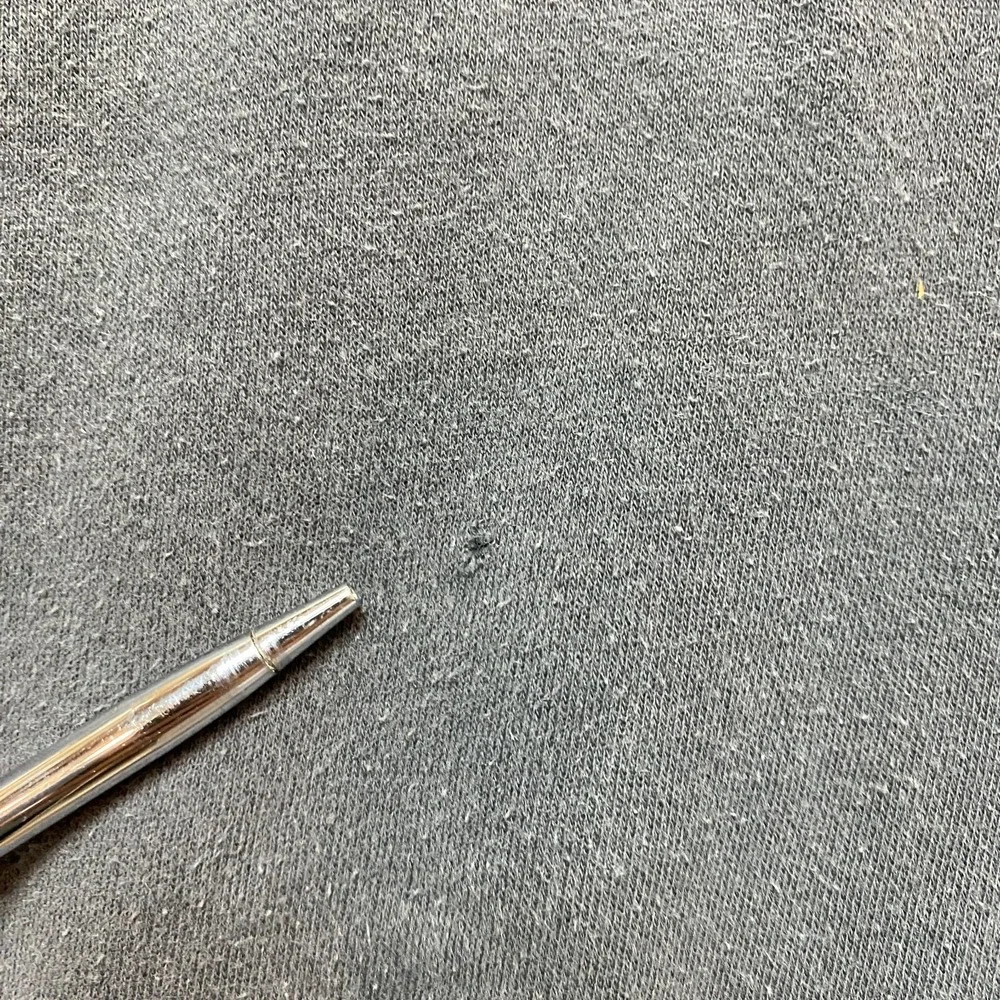 Nike tiny holes